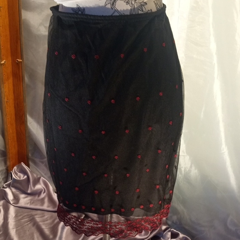 Black Pencil Skirt with Red Embroidered Accents and Lace Hem
